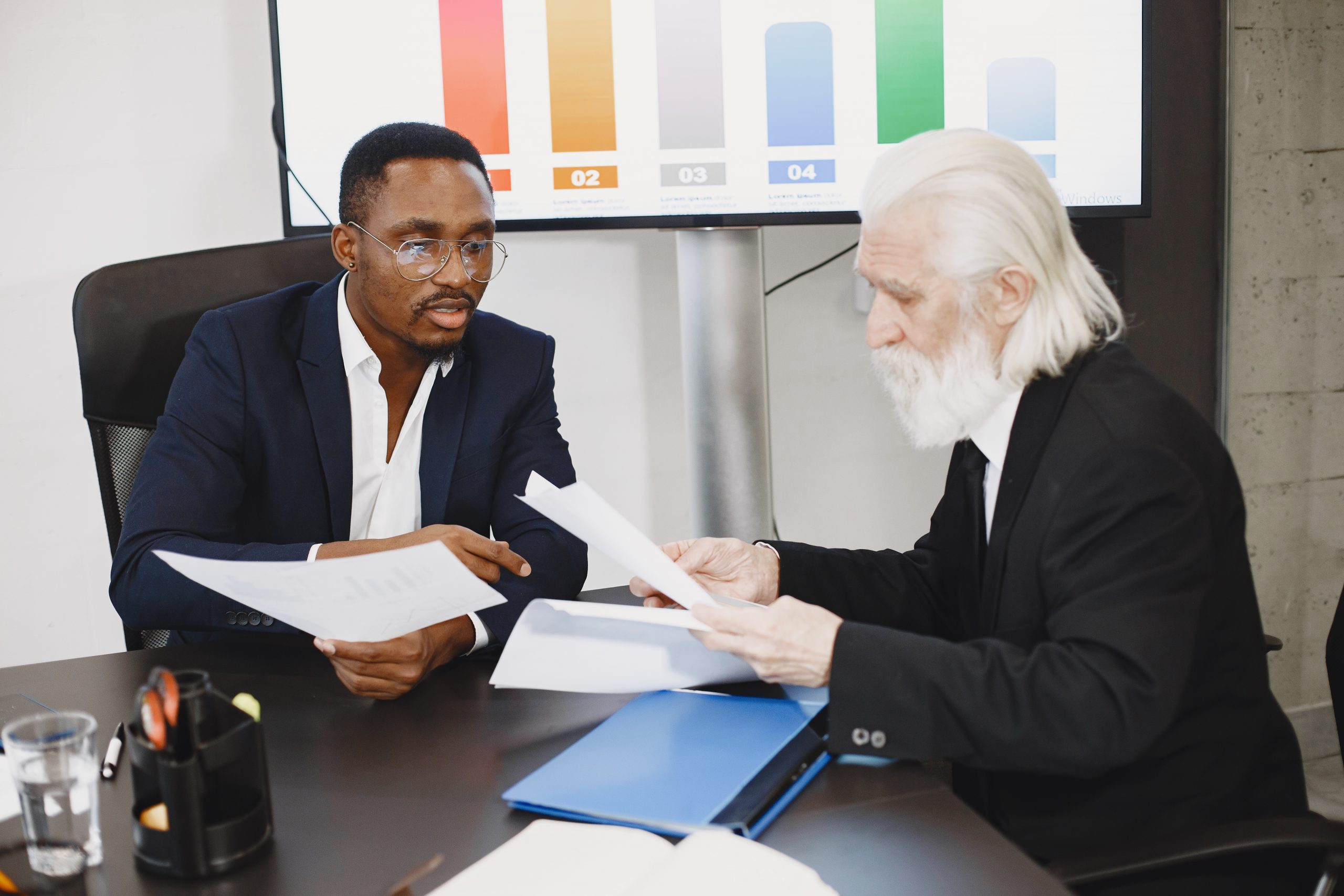 African man in a black suit